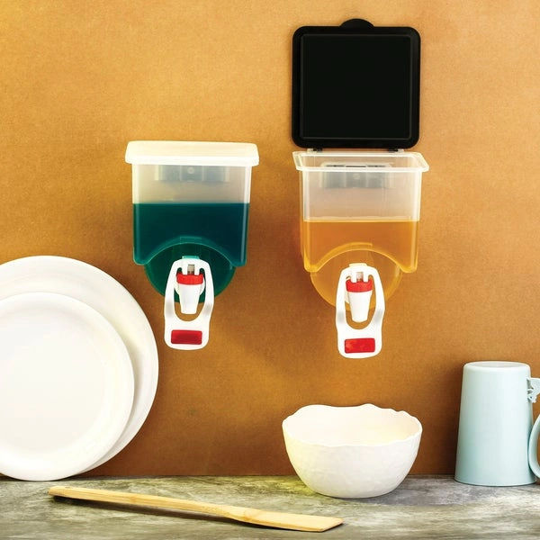 A Wall Mounted Oil Dispenser Bottle (1100ML Approx)This product is a household seasoning box, which adopts of odorless and environment- friendly material, safe and food- friendly to use. Multiple using range, it can be used for hotel, restaurant, store and some other places use. Creative and novel, useful and convenient to use. load- bearing capacity, adhesion without fear of heavy