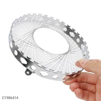 Stove Net- Stainless Steel Wire Mesh Gas Stove NetPackage Contains: It has 1 Piece of Gas Stove Net
Material: Stainless Steel
Color: Silver
Length: 14cm
Breadth: 14cm
Height: 2cm
Combo/Set Of: Pack of 1
Additional Information: Features:- Made of high quality material, anti-rust, wear resistant and has high temperature resistance.- Perfect for gas cooker to gather the flame, windpro