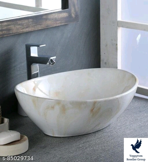 Bherunath Art Wash Basin Counter Top, Tabletop Ceramic Bathroom Sink/Basin Vessel Sink For Bathroom & Living Room (Dimension 410x340x145mm)Name: Bherunath Art Wash Basin Counter Top, Tabletop Ceramic Bathroom Sink/Basin Vessel Sink For Bathroom & Living Room (Dimension 410x340x145mm)Material: CeramicColor: CreamType: Counter TopProduct Breadth: 13 InchProduct Height: 5 InchProduct 