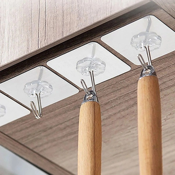 MULTIPURPOSE STRONG SMALL STAINLESS STEEL ADHESIVE WALL HOOKS.  10pc  pack @290. 