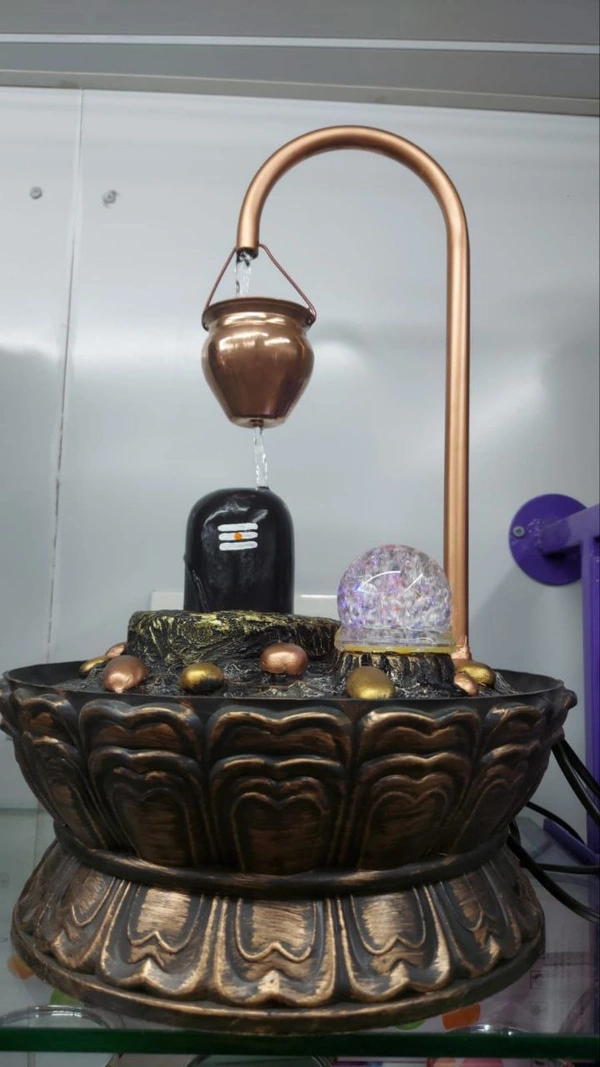 Magic Shivling FountainWater Fountain for Home Table Top DecorationMaterial - FiberHeight - 1.5 feetWeight - 2.5 KgPrice -  ₹2,699.00M.R.P.: ₹2,999.00 Booking compulsoryNo Discount - Height 1.5 Feet
