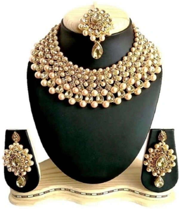 Alloy Jewel SetColor :GoldColor Code :GOLDModel Number :ZN 125GOLDSales Package Id :1Type :Chain & Earring SetBase Material :AlloyPlating :Gold-plated7 Days Return Policy, No questions asked.