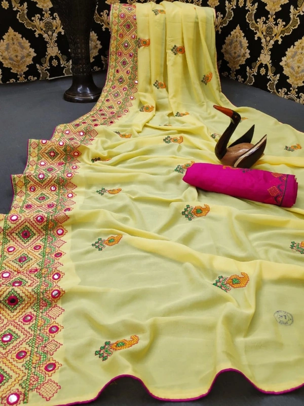 🧶Saree Fabric: Nakoda Vichitra🧶Blouse: Separate Blouse Piece🧶Blouse Fabric: Banglory🧶Work : Mirror work🧶Multipack: Single🧶Sizes:Free Size (Saree Length Size: 5.5 m, 🧶Blouse Length Size: 0.8 m)💰