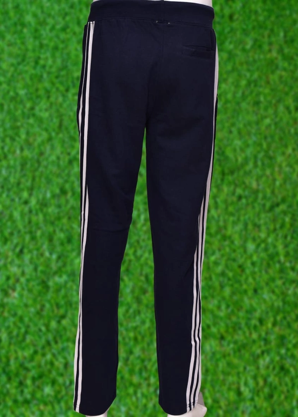 *Human Sparsh Track Pants - Black*Whether you want to run, relax or sleep, these track pants would be a great choice for you. Black Colour goes well with almost all the t-shirts.Design: Solid Colour with Stripes on the sidesPockets: Double Side Pockets with Zip and a Back PocketWaist: It has the elasticated waistband with drawstringsFit: RegularMaterial: 280 gsm Cotton fabricWash: