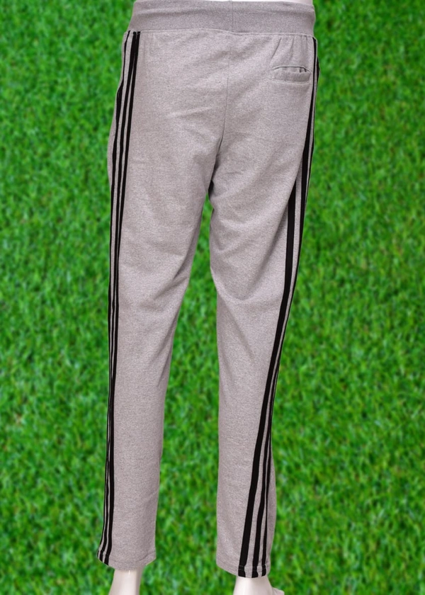 *Human Sparsh Track Pants – Grey Melange*Whether you want to run, relax or sleep, these track pants would be a great choice for you.Grey Colour keeps you relaxed and calm to rejuvenate you for the rest of the time when you’re not wearing it.Design: Solid Colour with Stripes on the sidesPockets: Double Side Pockets with Zip and a Back PocketWaist: It has the elasticated waistband wi