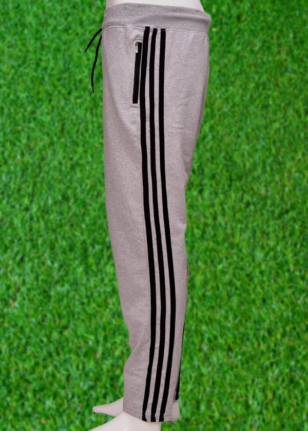 *Human Sparsh Track Pants – Grey Melange*Whether you want to run, relax or sleep, these track pants would be a great choice for you.Grey Colour keeps you relaxed and calm to rejuvenate you for the rest of the time when you’re not wearing it.Design: Solid Colour with Stripes on the sidesPockets: Double Side Pockets with Zip and a Back PocketWaist: It has the elasticated waistband wi - Xl