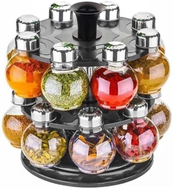 Plastic Big Revolving Spice Rack 16in1/Masala Rack 16 Piece Spice Set (Plastic) 1 Piece Spice SetSales Package :1 condiment setPack of :1Color :Clear, SteelMaterial :PlasticModel Number :360�° Revolving Spice Rack Masala Rack Spice Box Masala Box Masala Container (1 Stand,16 Plastic Bottles With Steel Cap) Set 16 Piece Spice Set (Plastic)_sp1Model Name :Plastic Big Revolving Spic