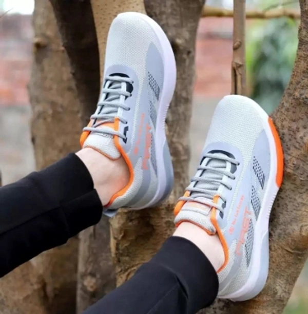 Running Shoes For MenArticle Number :74Brand :CrazylyColor Code :GREYSize in Number :41UK India Size :7color :Grey, WhiteIdeal For :Men7 Days Return Policy, No questions asked. - 10