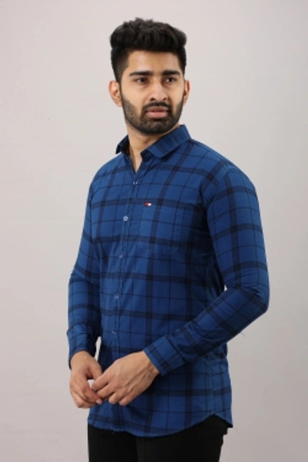 Surhi Men Checkered Casual Blue ShirtFabric: Pure CottonSlim Fit, Full SleevePattern: CheckeredSet of 1. , 10 Days Return Policy, No questions asked.