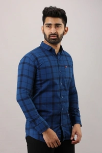 Surhi Men Checkered Casual Blue ShirtFabric: Pure CottonSlim Fit, Full SleevePattern: CheckeredSet of 1. , 10 Days Return Policy, No questions asked. - Xl