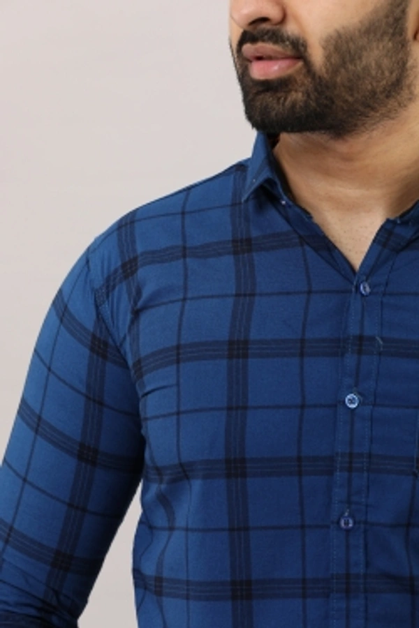 Surhi Men Checkered Casual Blue ShirtFabric: Pure CottonSlim Fit, Full SleevePattern: CheckeredSet of 1. , 10 Days Return Policy, No questions asked. - Xl