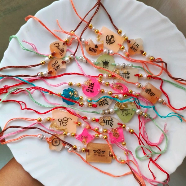 Resin Rakhi Pack Of 100 Pcs Mix 