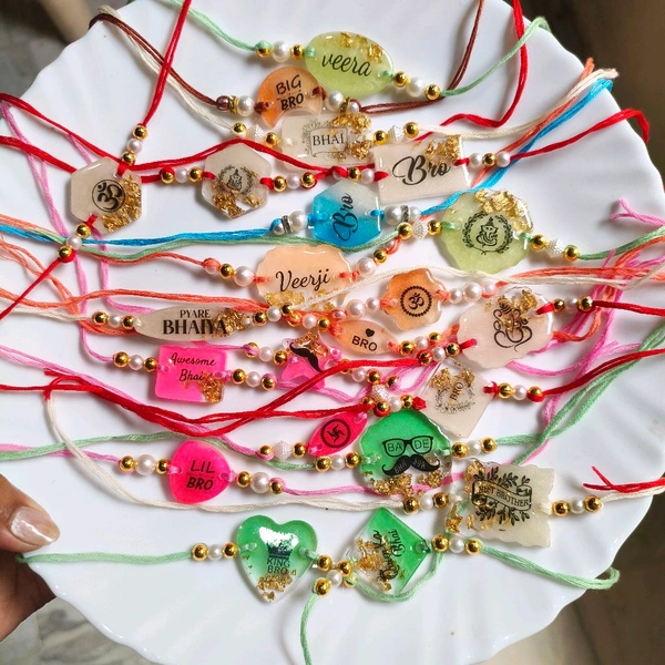 Resin Rakhi Pack Of 100 Pcs Mix 