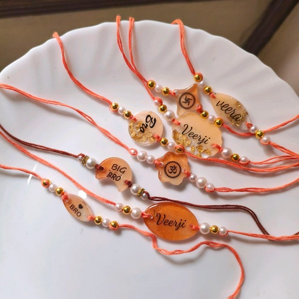 Resin Rakhi Pack Of 100 Pcs Mix 