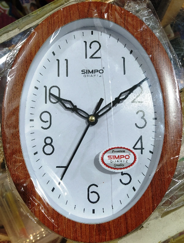 Wall Clock Oval - Medium, Brown