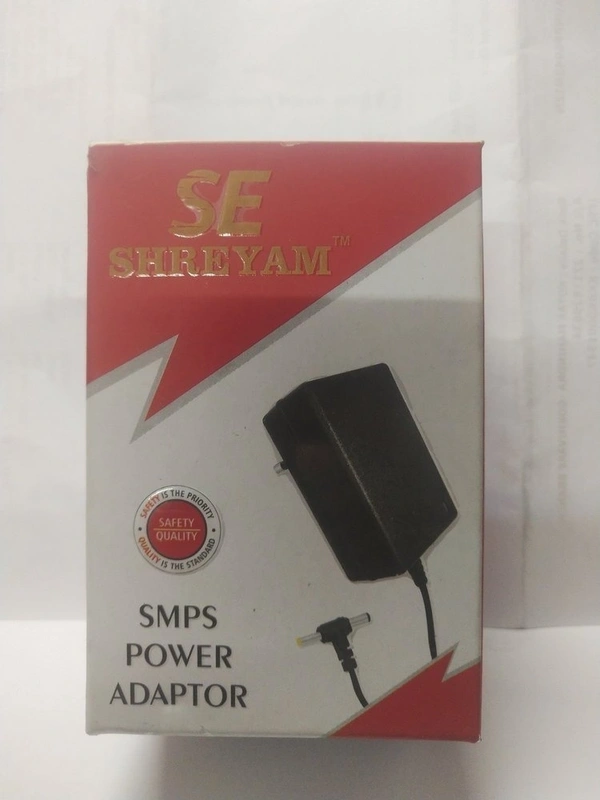 Shreyam SE 204 SMPS Power Adapter 10V-1AMP Adapter DC Plus Sony Pin (Black)
