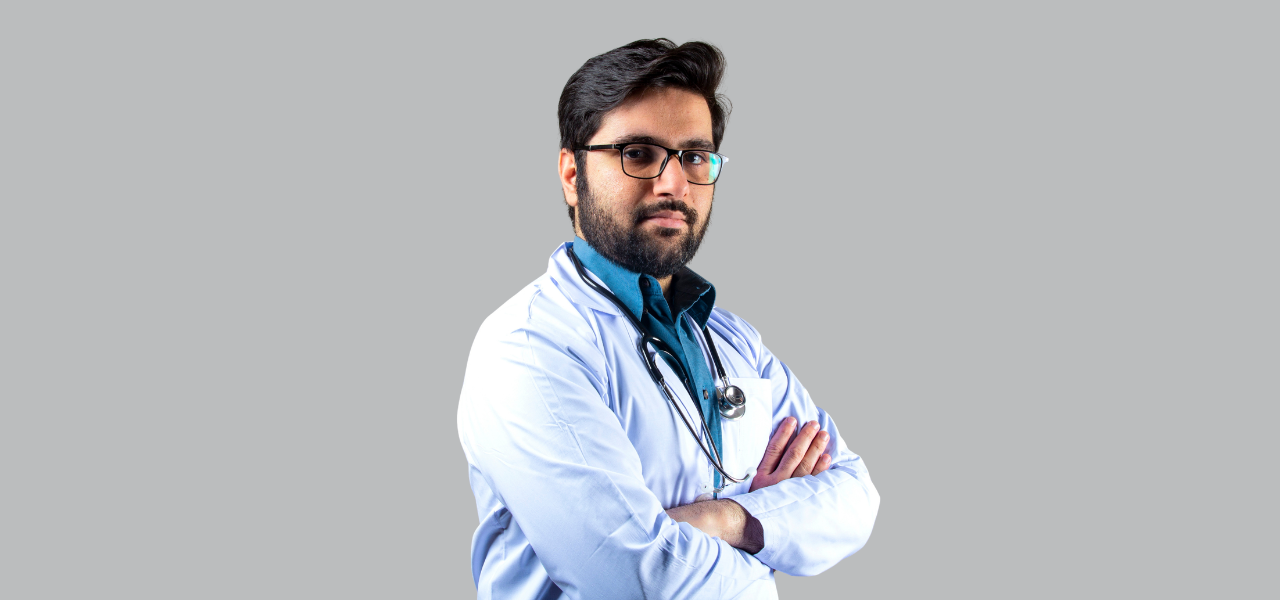Indian patient confidently talking to doctor with checklist