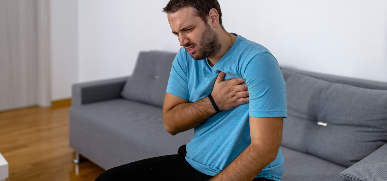 Young Indian man with chest pain