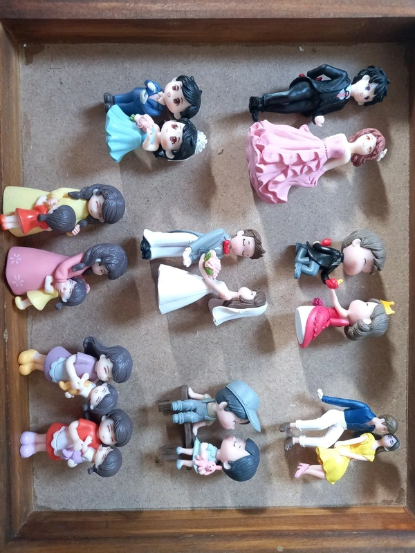 Miniature Couple With Bench