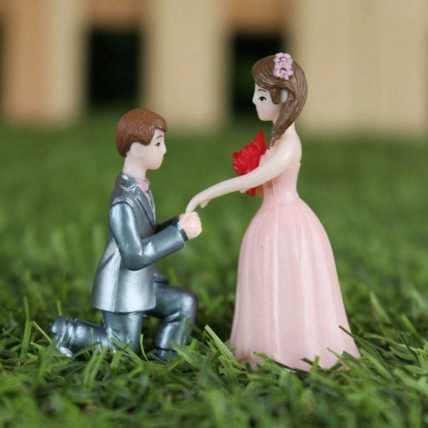 Miniature Proposing Couple 