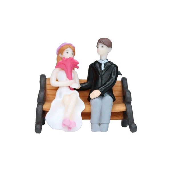Miniature Couple On Bench