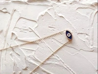 Minimal Evil Eye Pendants & Lockets