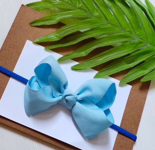 Boutique Bow Sky Blue Colour  Bow and Dark Blue Headband. - Free Size Stretchable Headband