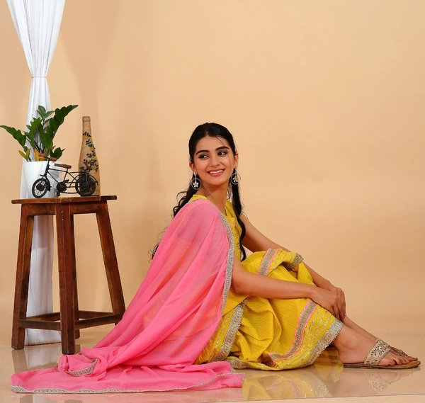 Premium heavy cotton lurex designer tire pattern gown with side slit detailed with heavy gota work all over. - L