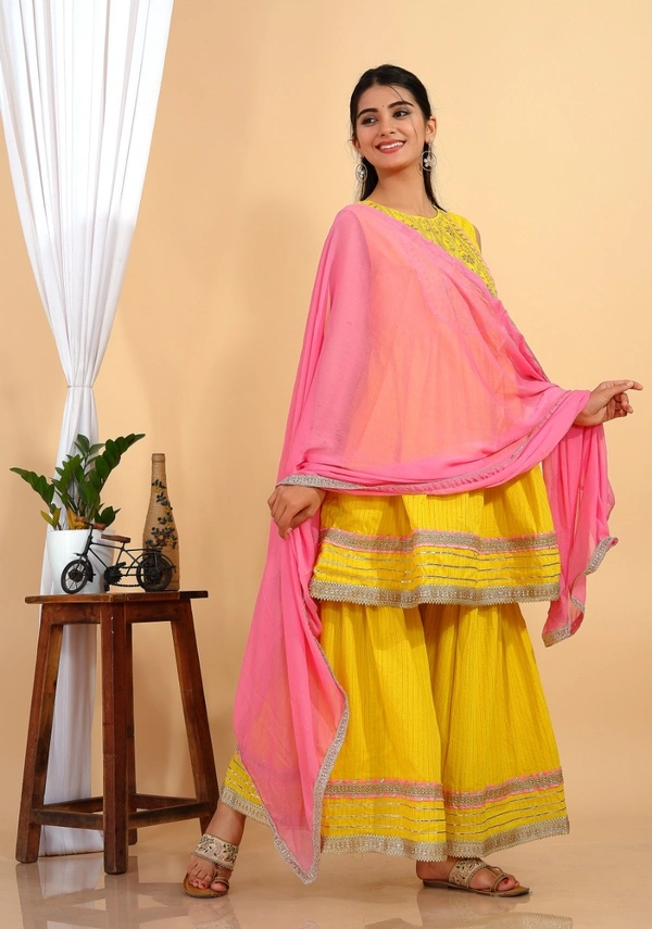 Premium heavy cotton lurex designer tire pattern gown with side slit detailed with heavy gota work all over. - XL