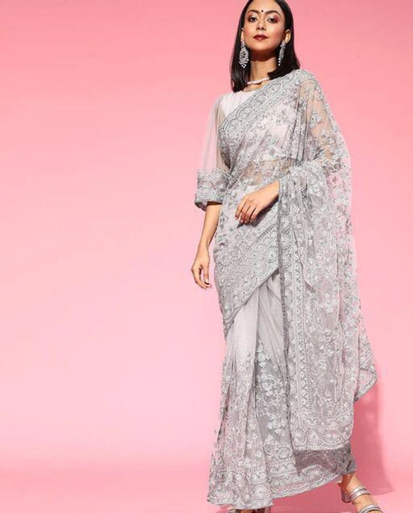 Light grey net saree with heavy Embroidered Sare