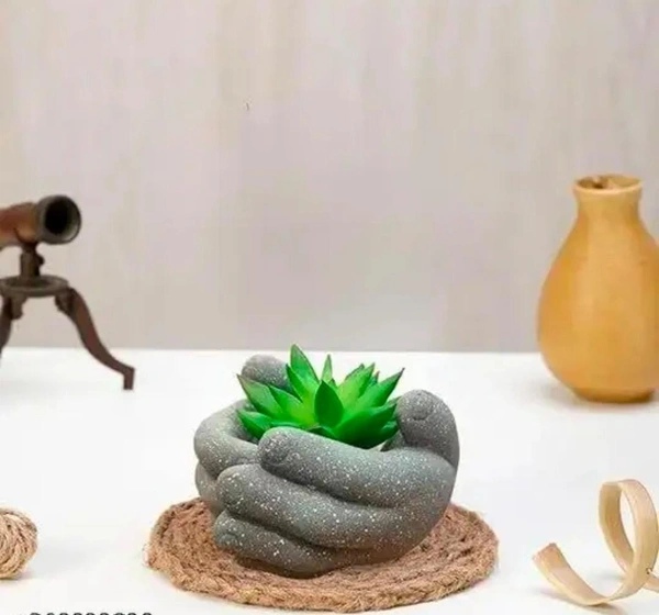 Mini artificial plant with hand