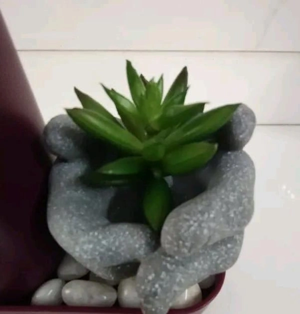 Mini artificial plant with hand