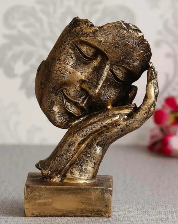 Antique look human face showpiece