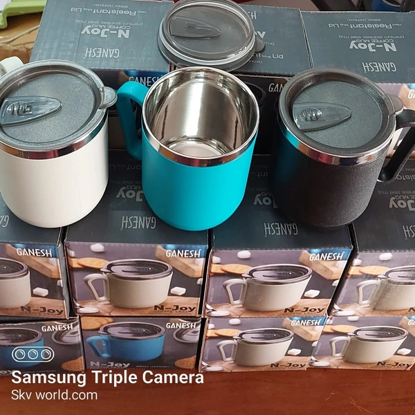 8137 GANESH PREMIUM STAINLESS STEEL COFFEE MUG WITH HEAT RESISTANT MUG LID. APPROX 400ML MUG.