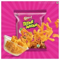 Bingo Masala Tadka Tedhe Medhe 75 g - General Information Brand	Bingo Manufacturer	ITC Ltd. Manufacturer Address	 ITC Limited 37, J.L. Nehru Road, Kolkata - 700071  Manufacturer Email	itccares@itc.in Manufacturer Website	www.aashirvaad.com