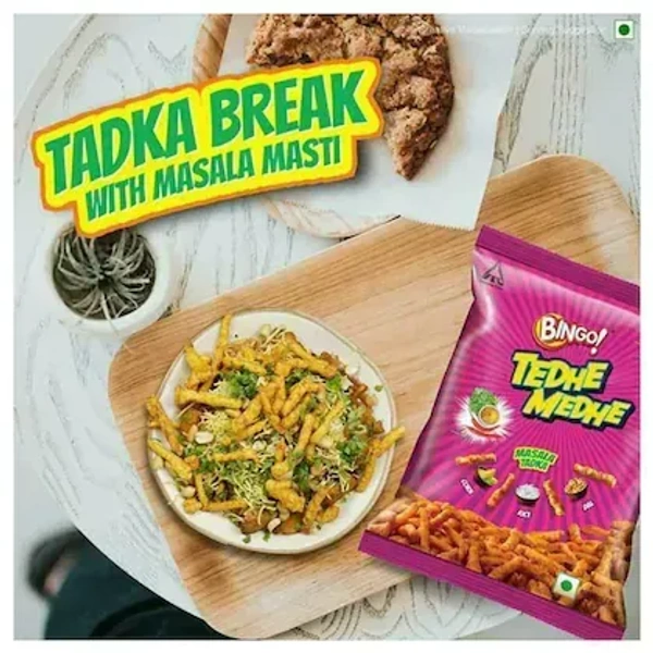Bingo Masala Tadka Tedhe Medhe 75 g - General Information Brand	Bingo Manufacturer	ITC Ltd. Manufacturer Address	 ITC Limited 37, J.L. Nehru Road, Kolkata - 700071  Manufacturer Email	itccares@itc.in Manufacturer Website	www.aashirvaad.com