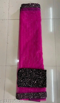 Ready To Wear Net Light Pink Sequinned Saree With BlouseName: Ready To Wear Net Light Pink Sequinned Saree With BlouseSaree Fabric: NetBlouse: Separate Blouse PieceBlouse Fabric: VelvetPattern: EmbellishedBlouse Pattern: Same as BorderNet Quantity (N): SingleSAREE FABRIC : Heavy Pure butter fly net , WORK : Beautiful sequence work with 5 mm hanging sequnce tone to tone lace broder  - Black