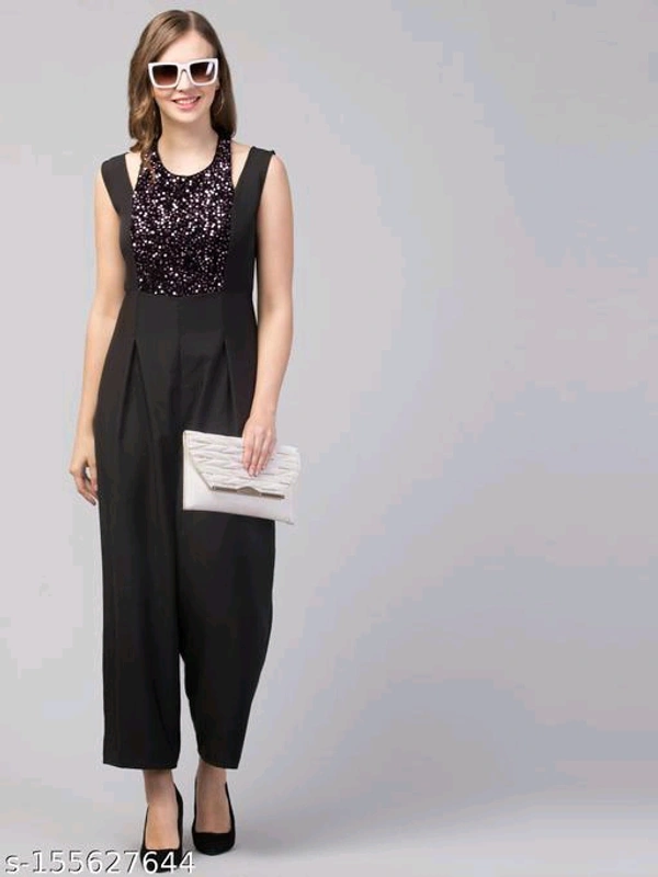 Women Girls Sequined Style Sleeveless Solid JumpsuitName: Women Girls Sequined Style Sleeveless Solid JumpsuitFabric: GeorgetteSleeve Length: SleevelessPattern: SolidNet Quantity (N): 1Sizes: M (Bust Size: 36 in, Length Size: 52 in, Waist Size: 30 in) Elevate your look with this ever-so-charming in Sequined Jumpsuit. It's very good choice to add it to your wardrobe for summer colle - M