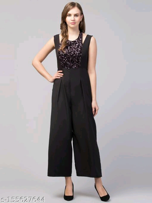 Women Girls Sequined Style Sleeveless Solid JumpsuitName: Women Girls Sequined Style Sleeveless Solid JumpsuitFabric: GeorgetteSleeve Length: SleevelessPattern: SolidNet Quantity (N): 1Sizes: M (Bust Size: 36 in, Length Size: 52 in, Waist Size: 30 in) Elevate your look with this ever-so-charming in Sequined Jumpsuit. It's very good choice to add it to your wardrobe for summer colle - M