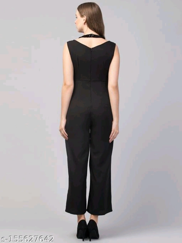 Women Girls Sequined Style Sleeveless Solid JumpsuitName: Women Girls Sequined Style Sleeveless Solid JumpsuitFabric: GeorgetteSleeve Length: SleevelessPattern: SolidNet Quantity (N): 1Sizes: M (Bust Size: 36 in, Length Size: 52 in, Waist Size: 30 in) Elevate your look with this ever-so-charming in Sequined Jumpsuit. It's very good choice to add it to your wardrobe for summer colle - M