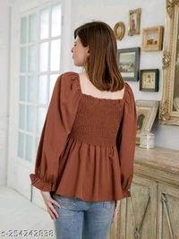 NEW KANSI TOPName: NEW KANSI TOPFabric: CrepeSleeve Length: Long SleevesPattern: Self-DesignNet Quantity (N): 1Sizes:S, M, L, XLCountry of Origin: India - Brown