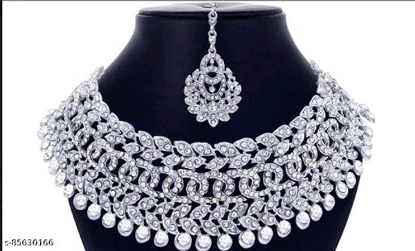 Rhodium Plated Jewellery Set White Austrian DiamondName: Rhodium Plated Jewellery Set White Austrian DiamondBase Metal: AlloyPlating: Silver PlatedStone Type: Cubic Zirconia/American DiamondSizing: AdjustableType: Necklace Earrings MaangtikaNet Quantity (N): 1Rhodium Plated Jewellery Set White Austrian DiamondCountry of Origin: India