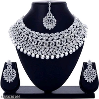 Rhodium Plated Jewellery Set White Austrian DiamondName: Rhodium Plated Jewellery Set White Austrian DiamondBase Metal: AlloyPlating: Silver PlatedStone Type: Cubic Zirconia/American DiamondSizing: AdjustableType: Necklace Earrings MaangtikaNet Quantity (N): 1Rhodium Plated Jewellery Set White Austrian DiamondCountry of Origin: India