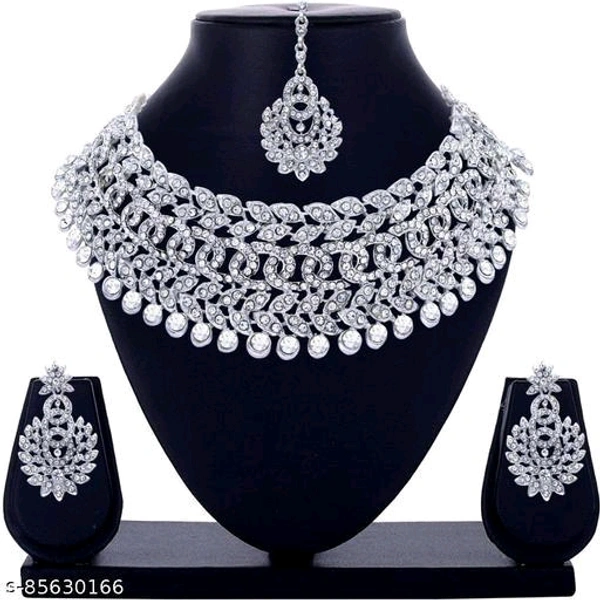 Rhodium Plated Jewellery Set White Austrian DiamondName: Rhodium Plated Jewellery Set White Austrian DiamondBase Metal: AlloyPlating: Silver PlatedStone Type: Cubic Zirconia/American DiamondSizing: AdjustableType: Necklace Earrings MaangtikaNet Quantity (N): 1Rhodium Plated Jewellery Set White Austrian DiamondCountry of Origin: India