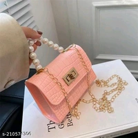 Mini jelly purse and handbags,waterproof and washable sling bagName: Mini jelly purse and handbags,waterproof and washable sling bagMaterial: PUNo. of Compartments: 1Pattern: SolidNet Quantity (N): 1Sizes:Free Size (Length Size: 5 in, Width Size: 2 in, Height Size: 4 in) Level up your accessory game with the Mini Jelly Sling Bag. Available in a trendy pearl handle for small girls a - Pink