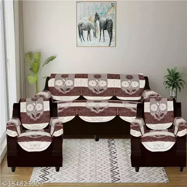 Name : Mebels Joy sofa cover set 5 seater with hands arms cover set of 16 pieces brown colour (3+1+1)Fabric : Cotton BlendNo. of Sofa Back Covers : 8No. of Sofa Seat Covers : 8Print or Pattern Type : FloralSet : Sofa SetShape : 3+1+1Type : Tie BackProduct Breadth : 29 InchProduct Height : 0 InchProduct Length : 69 InchNet Quantity (N) : 1The Pack contains 16 pieces of sofa cover se