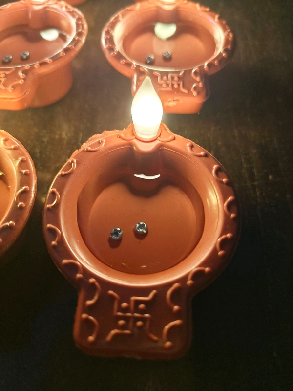 12PCS JYOT WATER DIYA, Water Sensor LED Diya – Pack of 12 Electric Diyas with Warm Ambient Light for Diwali, Christmas, New Year & Home Decoration(73) - 