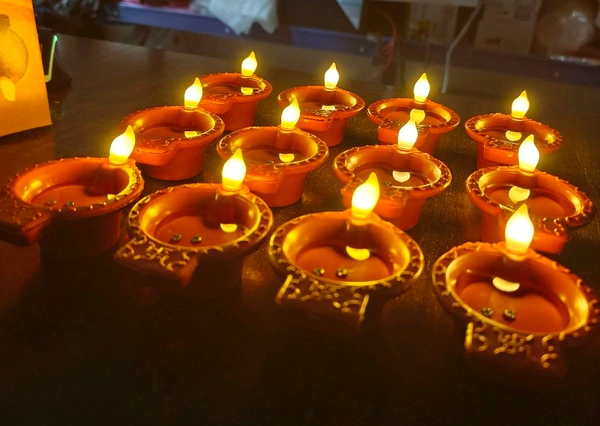 12PCS JYOT WATER DIYA, Water Sensor LED Diya – Pack of 12 Electric Diyas with Warm Ambient Light for Diwali, Christmas, New Year & Home Decoration(73) - 