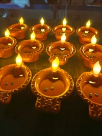 12PCS JYOT WATER DIYA, Water Sensor LED Diya – Pack of 12 Electric Diyas with Warm Ambient Light for Diwali, Christmas, New Year & Home Decoration(73) - 