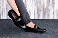 men trendy loafers Material: SyntheticSole Material: PuFastening: Slip OnToe Shape: Round ToeNet Quantity (N): 1STALISH SHOESSizes: IND-6, IND-7, IND-8, IND-9, IND-10Country of Origin: India - Black, 8